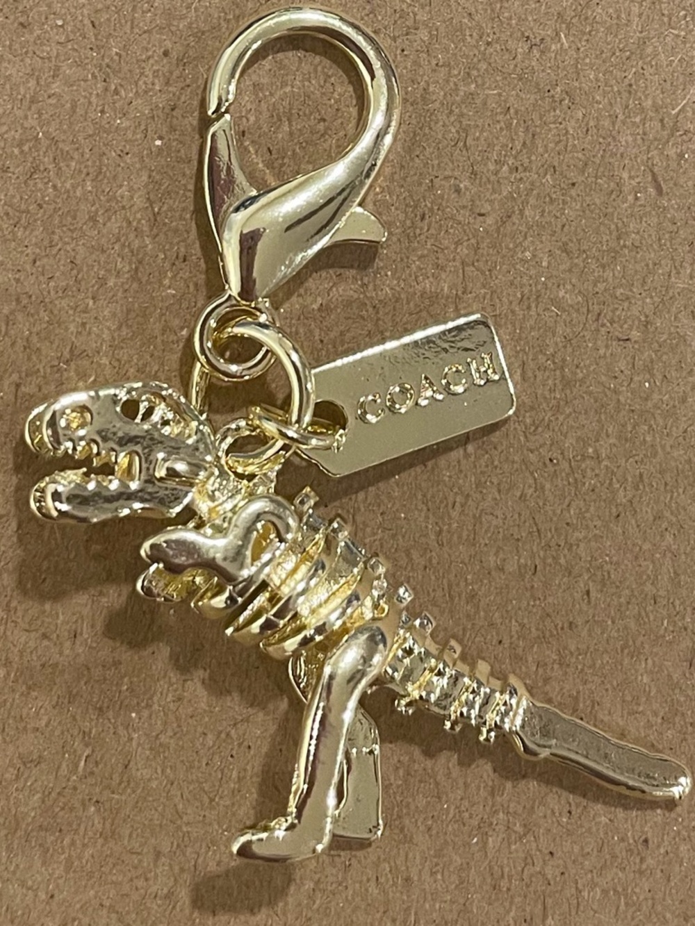 Coach Gold T-Rex Skeleton Charm with Lobster Clasp